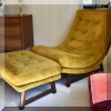 F42. Selig Mid Century Modern lounge chair and ottoman with gold upholstery. 